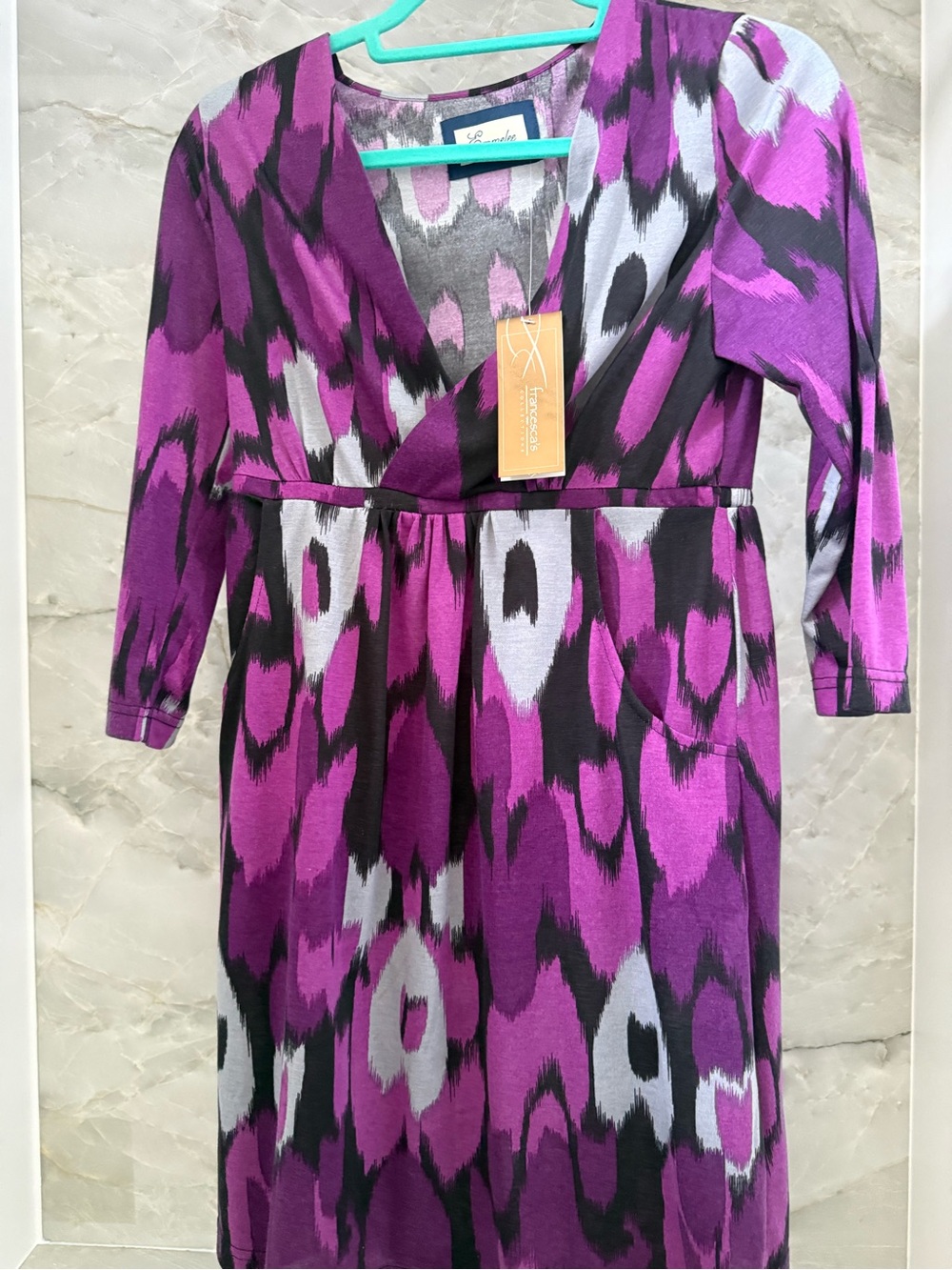 Vibrant purple and black abstract print dress from Francesca’s.
